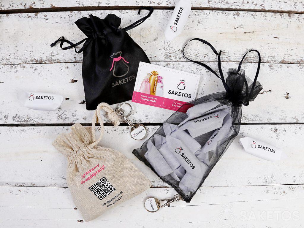 The packaging with the printed company logo - fabric bags with logo