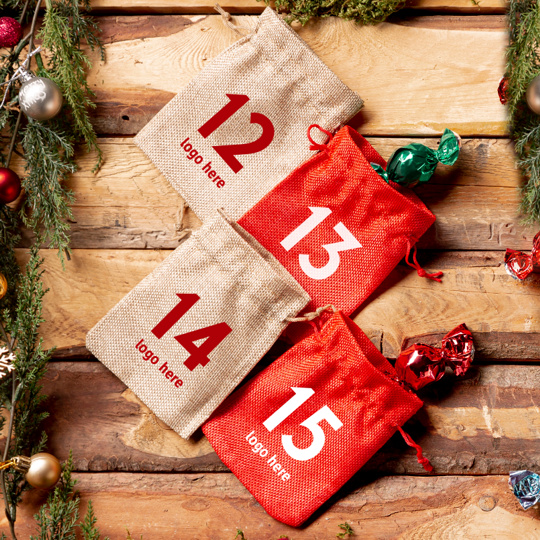 Bags with printing for Advent featuring the company's logo.